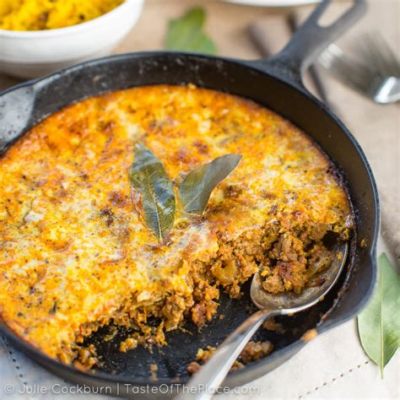   Bobotie: Een rijke kruidenmix ontmoet een romige saus bedekt met gegratineerde eieren!